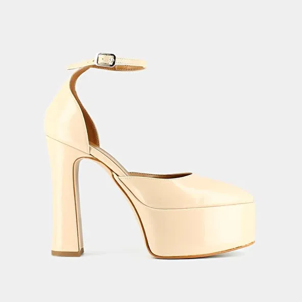 High heel pumps in beige patent